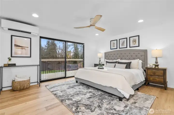 Owner Suite on main floor is a retreat to relax! Slider to deck & gorgeous en-suite bathroom!