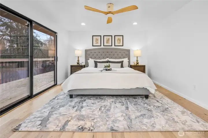 Owner Suite on main floor is a retreat to relax! Slider to deck & gorgeous en-suite bathroom!