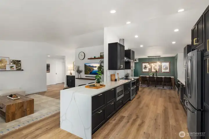Open to the dining room and family room, this kitchen is both beautiful and functional