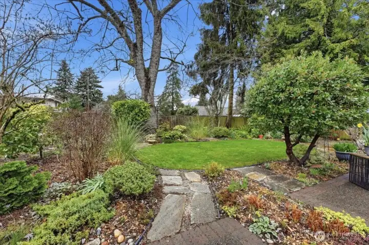 At every turn you'll find yourself wandering into beautiful, well thought out areas full of charm and purpose!  Sit, relax, entertain, and enjoy!