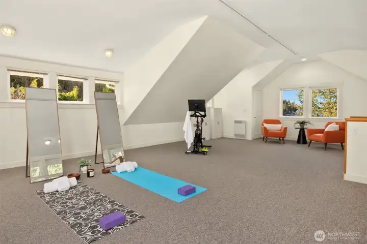 Huge flex space above the garage to do anything you can think of. Sellers used it as a movie room and craft space.