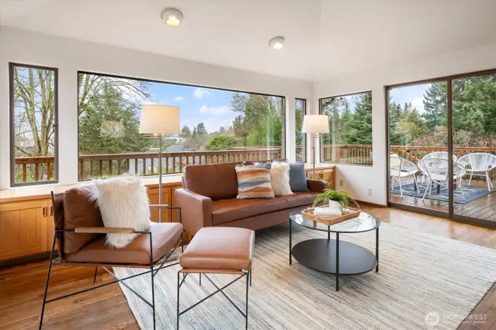 Family room or enjoy informal dining, with easy access to your expansive deck!