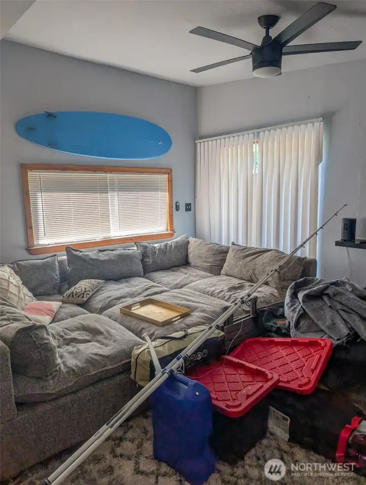 Living Room with lots of space and Fan to move air