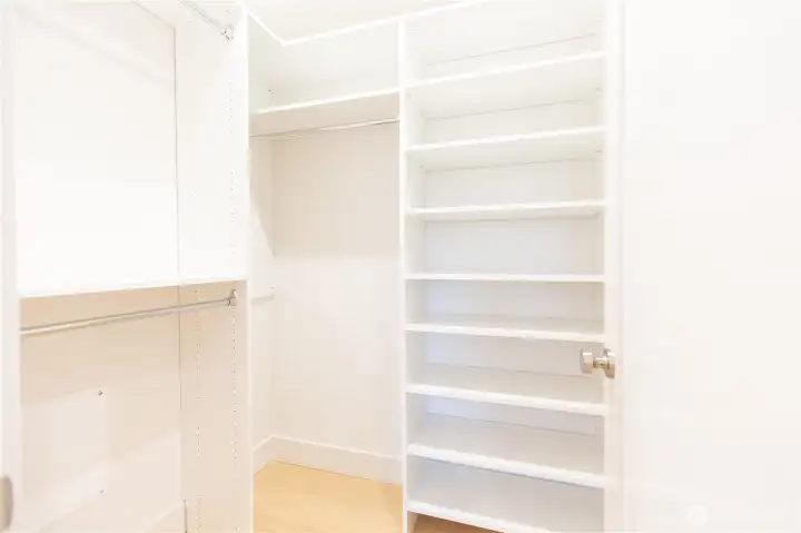 Primary bedroom closet Primary bedroom closet