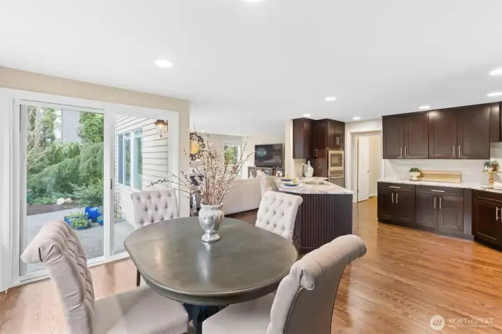 Seamless indoor-outdoor flow on the lower level allows for effortless entertaining and easy access to outdoor living spaces.