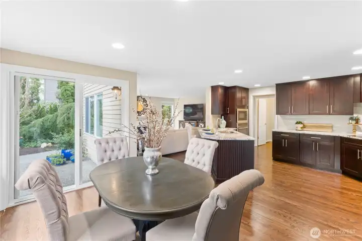 Seamless indoor-outdoor flow on the lower level allows for effortless entertaining and easy access to outdoor living spaces.