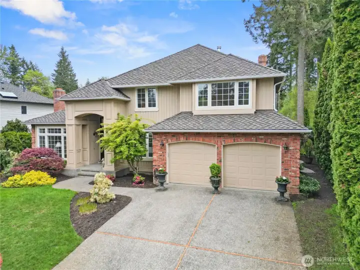 A 2-car garage features new doors and an updated operating system, thoughtfully upgraded and ready for years of reliable use.