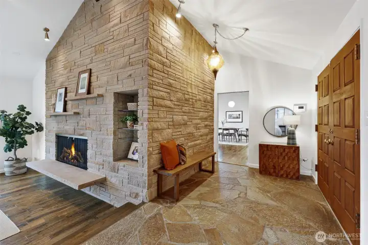 original Wilkinson stone fireplace & flagstone entry