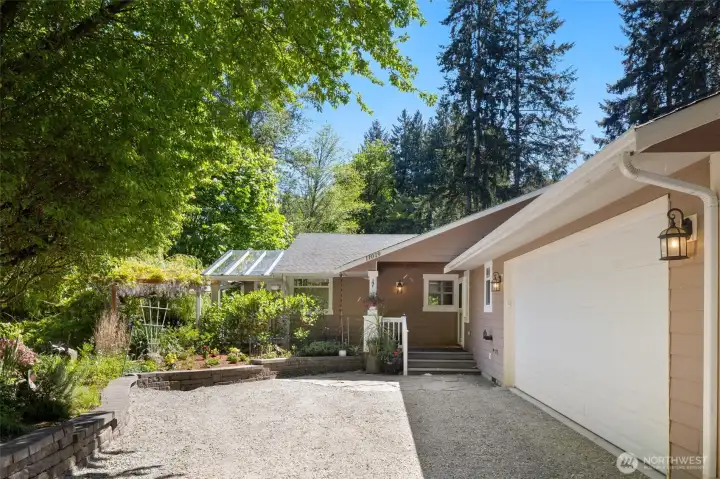 Wonderfully landscaped approach welcomes you home.