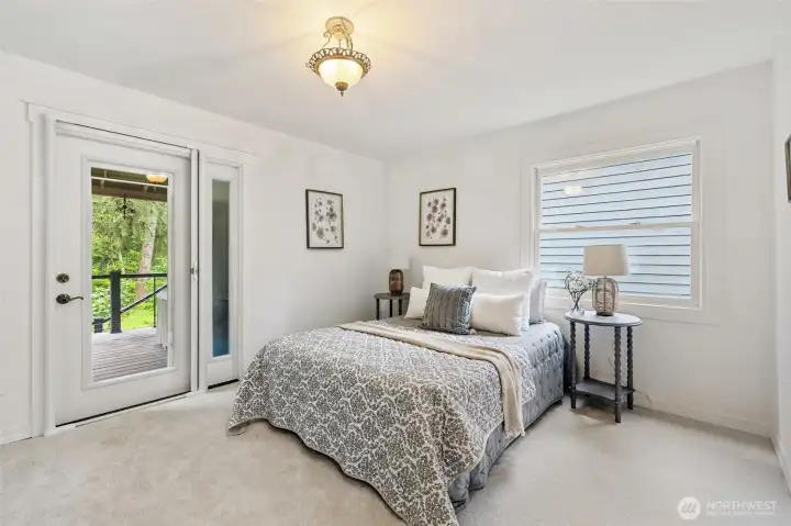 Bright bedroom with easy access to outdoor living.