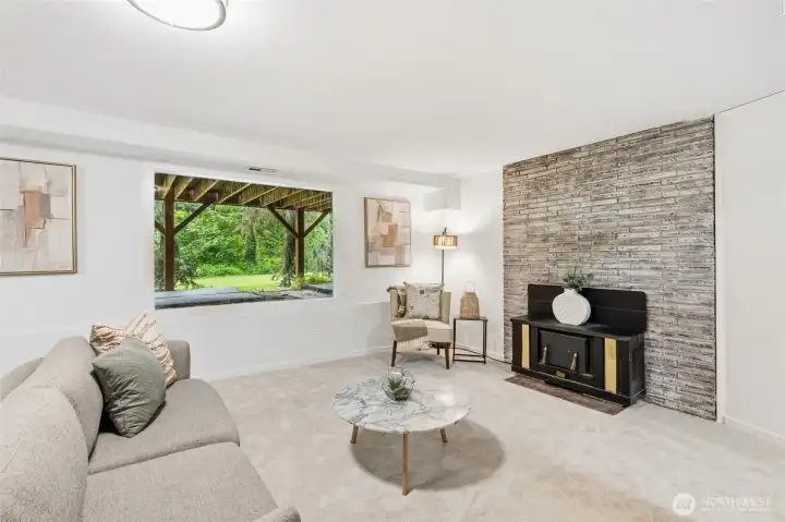 Cozy gathering space with fireplace with a wood-burning fireplace.