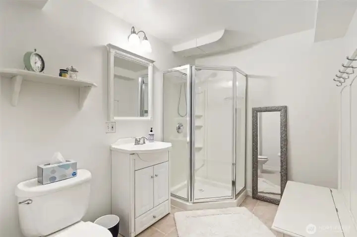 Bright and spacious bathroom with a walk-in shower and plenty of space.
