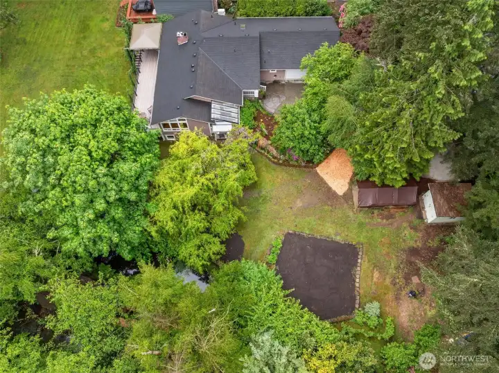Mature trees and lush landscaping frame the expansive grounds provide privacy and beauty.