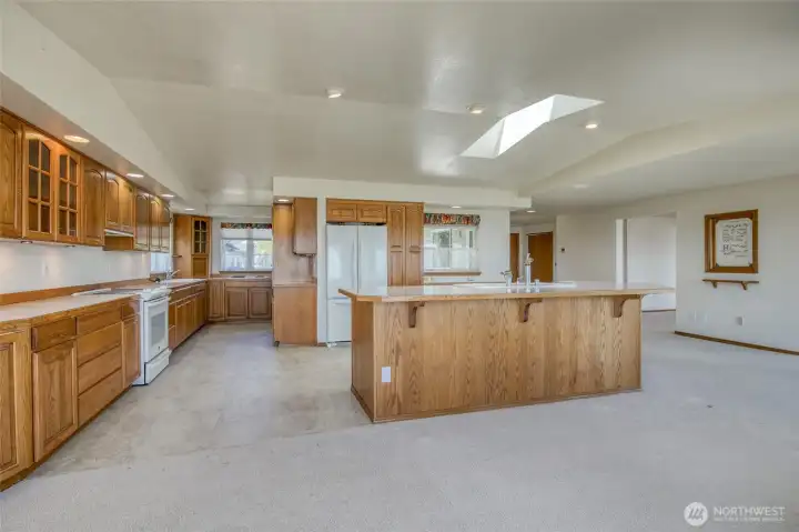 The kitchen has TWO full prep areas including two refrigerators, two ovens, two cooktops and two prep sinks!