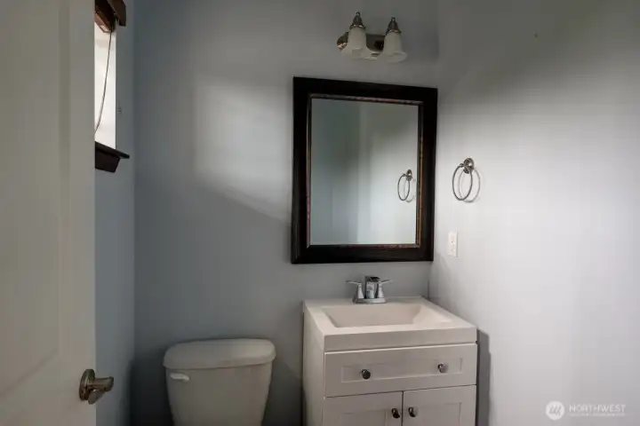 Main level half-bath. Main level half-bath.
