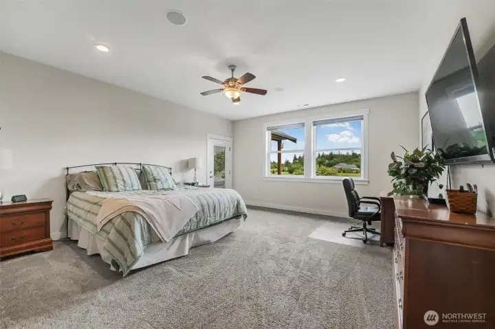 Primary Bedroom with access to back patio/hot tub, primary bathroom and walk-in closet. Primary Bedroom with access to back patio/hot tub, primary bathroom and walk-in closet.