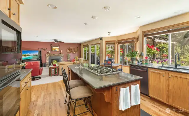 The family room flows from the kitchen and on-to the partially covered deck - a great place to entertain.