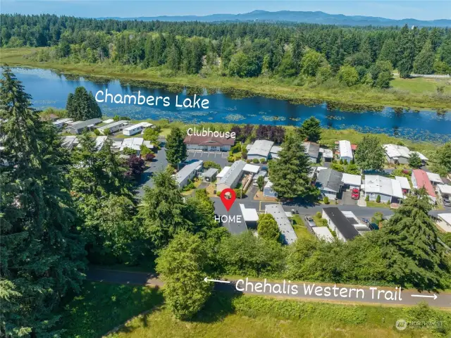 Enjoy direct access to the 22-mile Chehalis Western Trail right behind your home, perfect for walking, biking, and accommodating dogs and strollers for outdoor adventures.