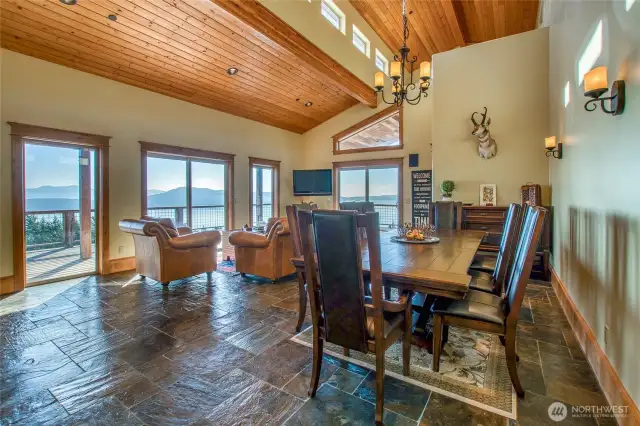 Every room in this home showcases a view!! Dining area shares more space to sit and relax. Or host Thanksgiving and add the BIG table and invite everyone.