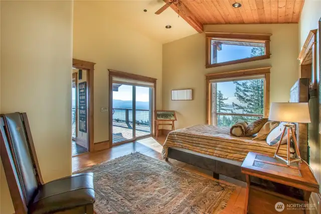Bonus room on main level opens up to wrap-around deck and spectacular views to the south and southeast.