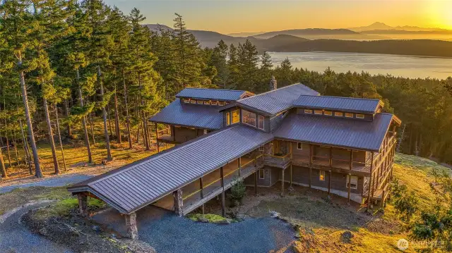 This home was designed to live life to the fullest. Three levels enhanced with bonus rooms, 4 bedroom ensuite plus bonus room, 6 bathrooms, entertaining bar, exercise room, sauna, loft, all surrounded by upper and lower covered decking