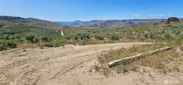 Building Site 2 in June - Upper portion of acreage near northern property line circular driveway