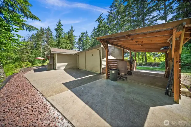 Carport offers a covered patio enjoyment space