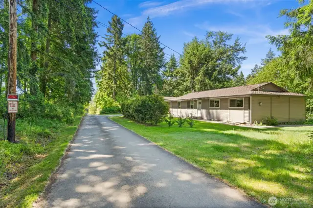 Enjoy seclusion on your private road, only a few neighbors use it