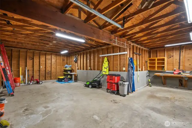 Shop area in garage, room for toys & projects