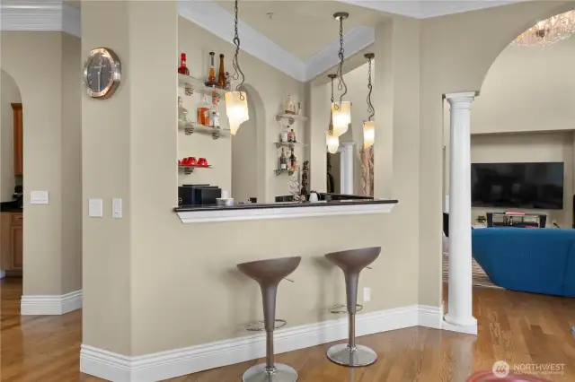 A bar area adjacent to the family room and breakfast nook