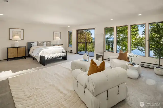 The primary is sizable and can accommodate both sleeping + sitting areas.