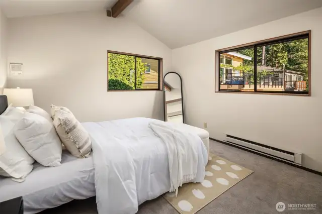 Vaulted ceilings for this room as well which overlooks the front orchard.