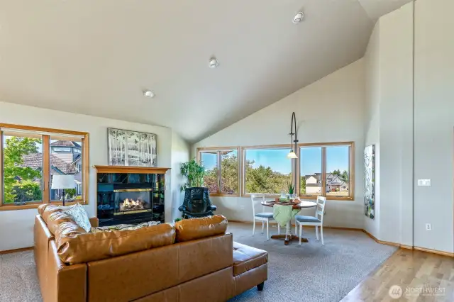With dramatic ceiling height and abundant windows, this inviting great room offers the perfect balance of openness and coziness—ideal for relaxing, hosting, or simply soaking in the view.