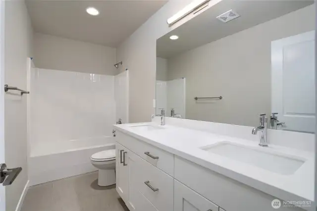 Photos are of another home in the community and are for illustration purposes only to reflect typical finishes.  May depict seller enhancements.  Colors and options may vary.