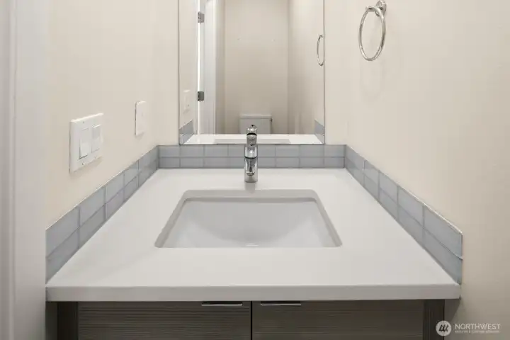 Half bath upstairs before heading to rooftop deck