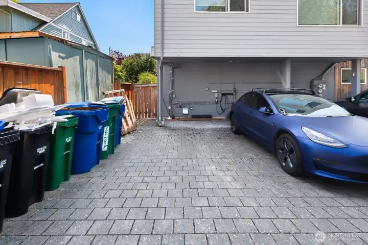 Off-street parking space with conduit for EV charging