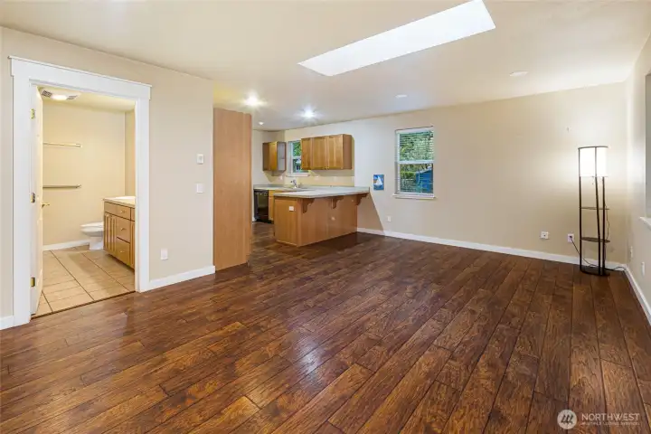 living room, kitchen with eating space, full bathroom