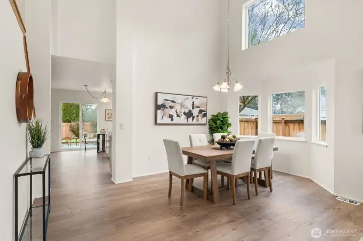 Defined by its airy proportions, this dining area offers a refined setting for everyday meals or special occasions. Its placement just off the main living areas supports easy hosting and a natural flow for entertaining.