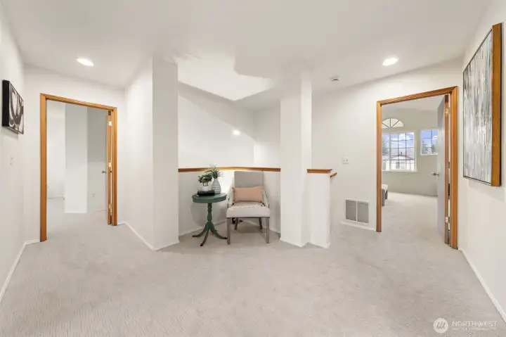 A wide upstairs landing creates a natural transition between bedrooms while offering open sightlines to the lower level. The layout provides flexibility for a reading nook or display space without interrupting flow.