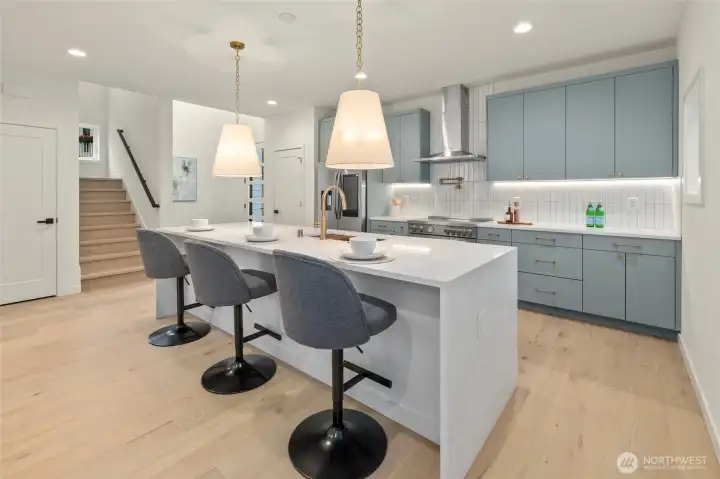 Kitchen has plenty of cabinets, storage and prep space