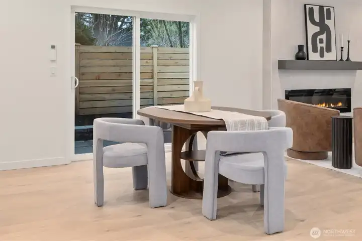 Dining area with access to side yard and patio