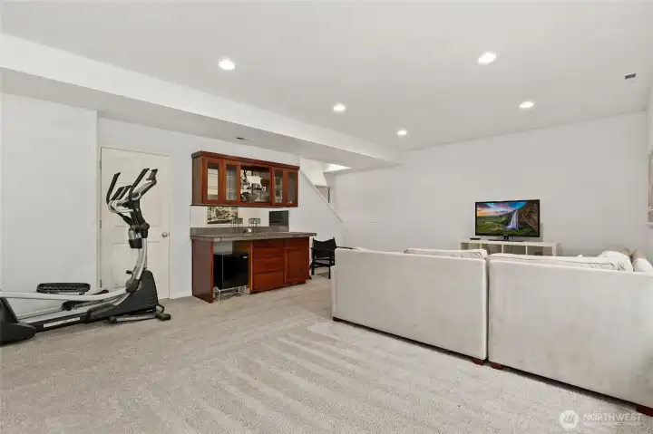 Rec room with ample under stairs storage
