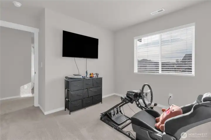 Bedroom #3, currently used as a gaming room.
