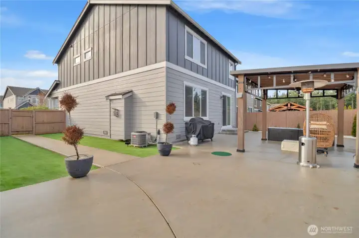 Backyard view three, Astroturf installed for easy pet cleanup and playing, truly no maintenance! Fully-fenced in or course as well.