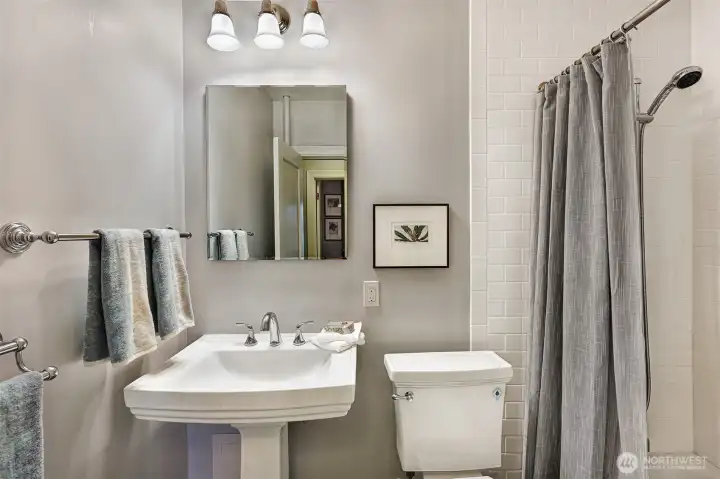 A full bath with updated flooring.