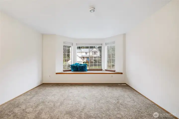 Bedroom with sitting area.