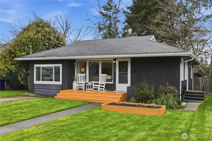 Charming mid century home with perfect front porch!