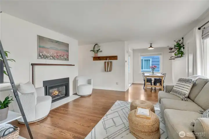 Living room with views of the dining room.