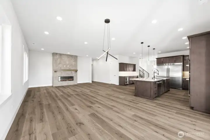 Spacious, open layout with cozy electric, fully tiled fireplace