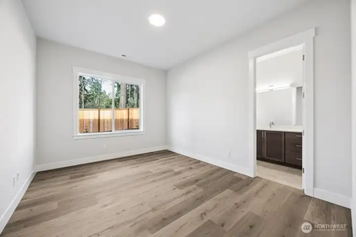 Main floor guest bedroom (#5) with ensuite.